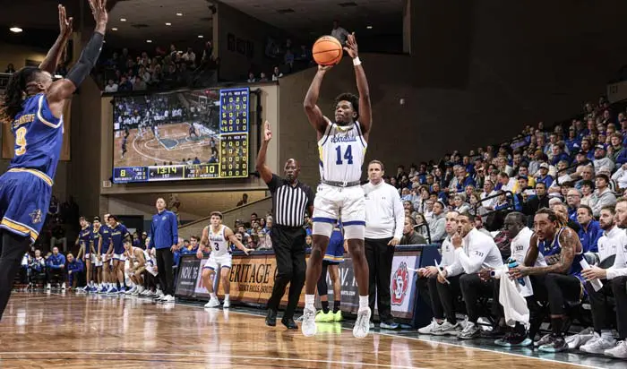 Basketball player mid shot